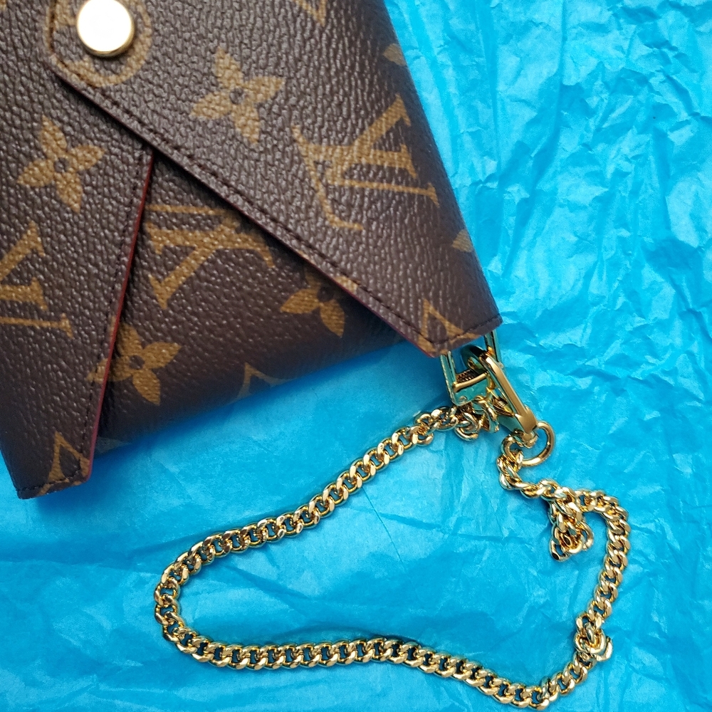 SOLD - Kirigami - Med. w/chain insert-Authentic Vuitton